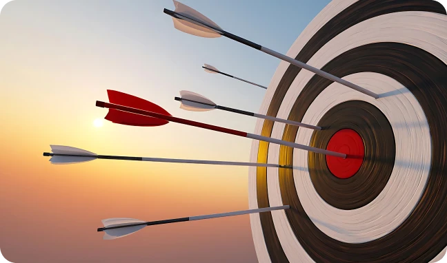 target with multiple white arrows and one red arrow in the center