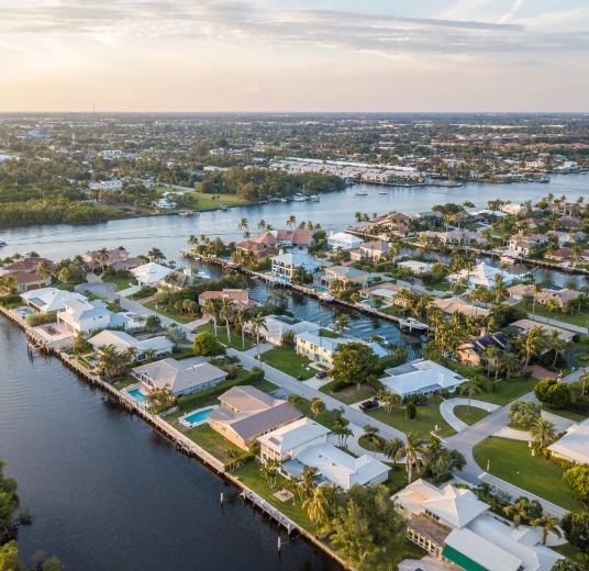 people looking at a laptop computer